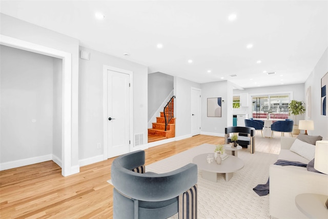 178-38 134th Ave, Springfield Gardens, NY 11434 - living room with stairs, light wood-style flooring, visible vents, and recessed lighting