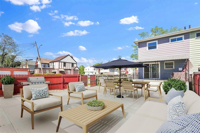 178-38 134th Ave, Springfield Gardens, NY 11434 - view of patio with an outdoor hangout area, outdoor dining area, fence, and area for grilling