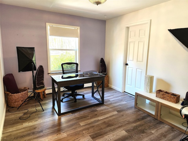 office featuring baseboards and wood finished floors