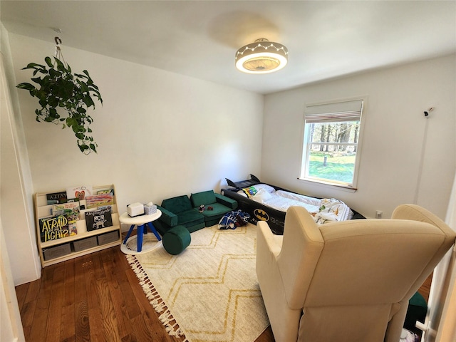 bedroom featuring wood finished floors
