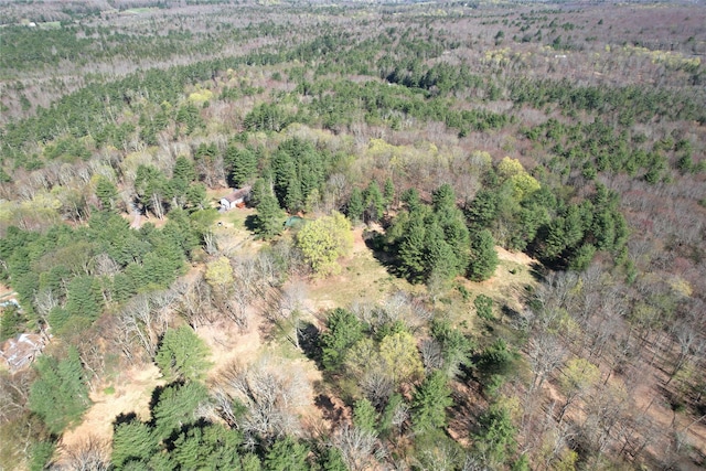 bird's eye view featuring a forest view