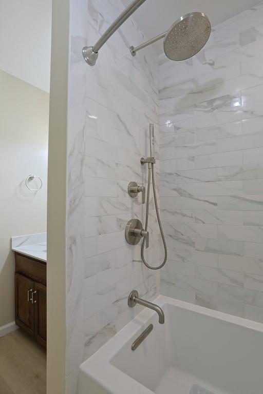 full bath featuring shower / bath combination and vanity