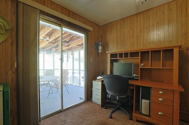office space with wooden walls and carpet flooring