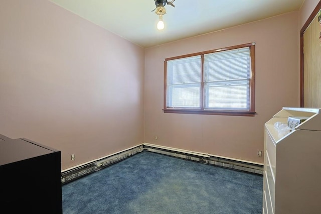 carpeted spare room with washer / clothes dryer