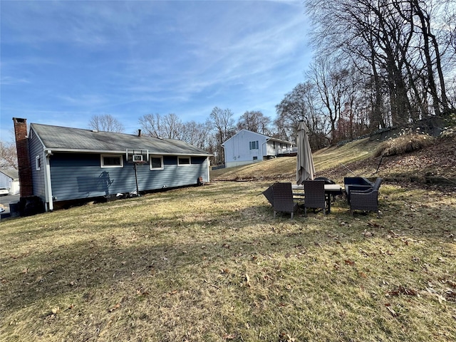 102 Capt Shankey Dr, Garnerville, NY 10923 - back of house with a lawn and a chimney