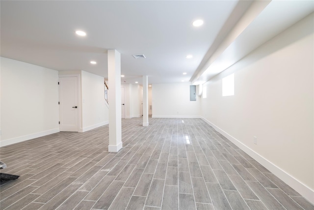 basement featuring visible vents, recessed lighting, and light wood-style floors