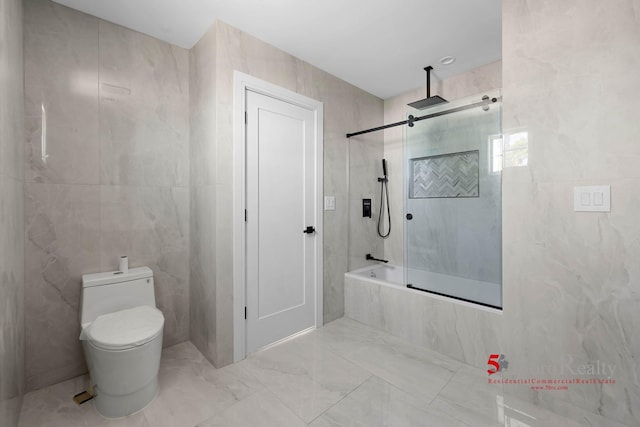 full bath featuring tile walls, a combined bath / shower with rainfall shower, toilet, and marble finish floor