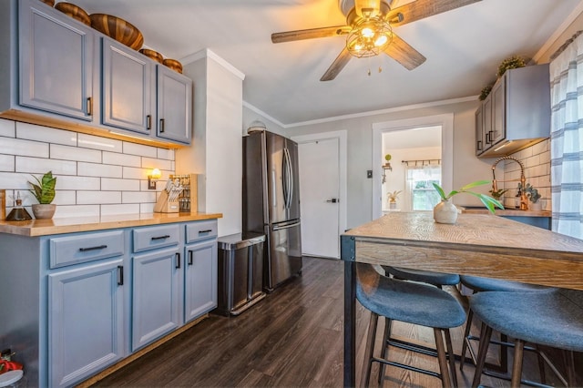 67 Summers St, Oyster Bay, NY 11771 - kitchen with backsplash, freestanding refrigerator, a ceiling fan, and dark wood-type flooring