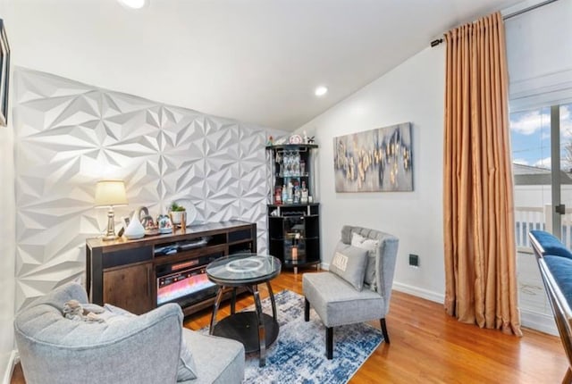 51 Graham St, Farmingdale, NY 11735 - living area featuring baseboards, recessed lighting, wood finished floors, and lofted ceiling