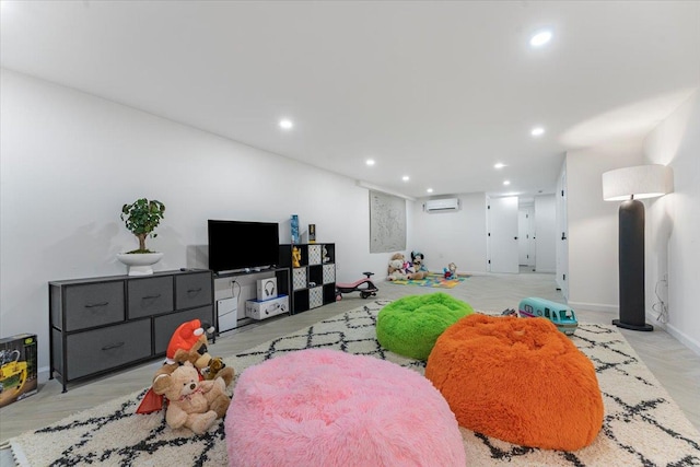 rec room with recessed lighting and a wall unit AC