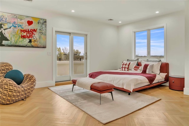 bedroom with baseboards, access to outside, recessed lighting, and visible vents