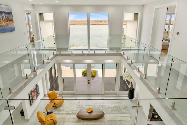 interior space featuring recessed lighting and stairs