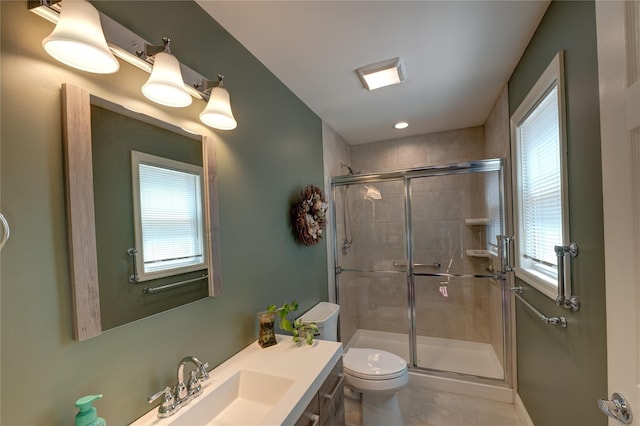 405 Linden St, Bellmore, NY 11710 - bathroom with vanity, baseboards, a stall shower, and toilet