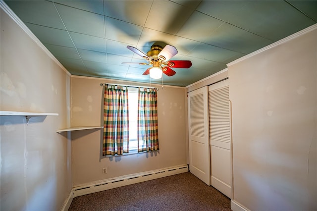 405 Linden St, Bellmore, NY 11710 - unfurnished bedroom with a closet, crown molding, baseboards, a baseboard heating unit, and carpet