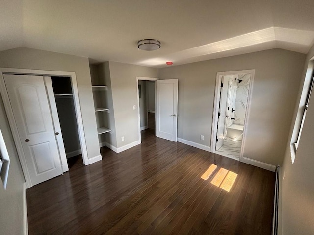 177-37 115th Ave, Saint Albans, NY 11434 - unfurnished bedroom with dark wood-style floors, baseboards, vaulted ceiling, a closet, and ensuite bath