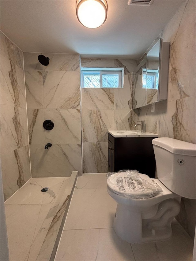 177-37 115th Ave, Saint Albans, NY 11434 - bathroom with a marble finish shower, toilet, and vanity