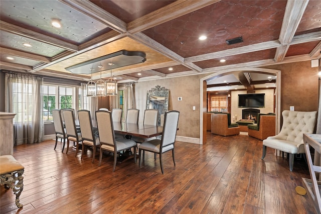 84 S Woods Rd, Woodbury, NY 11797 - dining space featuring coffered ceiling, crown molding, and baseboards