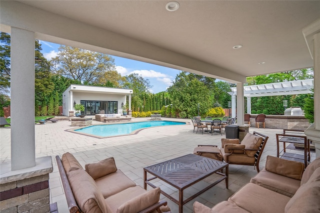 84 S Woods Rd, Woodbury, NY 11797 - outdoor pool with an outdoor kitchen, outdoor dining area, a hot tub, a patio, and an outdoor hangout area
