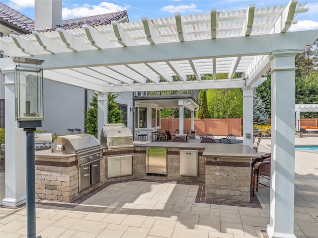 84 S Woods Rd, Woodbury, NY 11797 - view of patio / terrace with area for grilling, a pergola, a grill, and outdoor wet bar