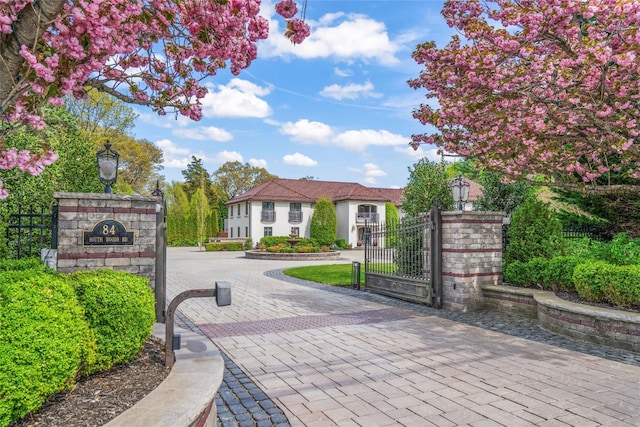 84 S Woods Rd, Woodbury, NY 11797 - view of gate featuring fence