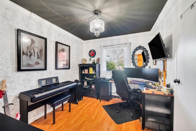 office space featuring crown molding, wallpapered walls, a chandelier, and wood finished floors