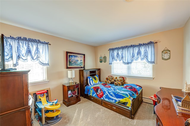 20 Bayview Rd, Amityville, NY 11701 - bedroom featuring a baseboard radiator, carpet, and baseboards