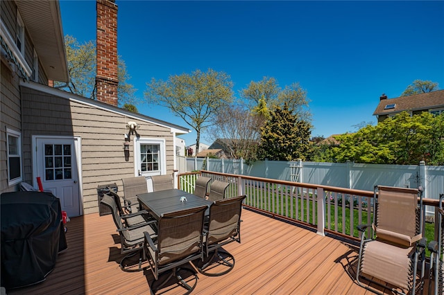 20 Bayview Rd, Amityville, NY 11701 - deck featuring a grill, outdoor dining space, and a fenced backyard