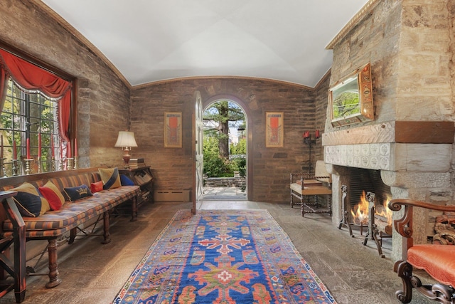 50 Hampshire Rd, Bronxville, NY 10708 - entrance foyer featuring a fireplace, lofted ceiling, and stone finish flooring