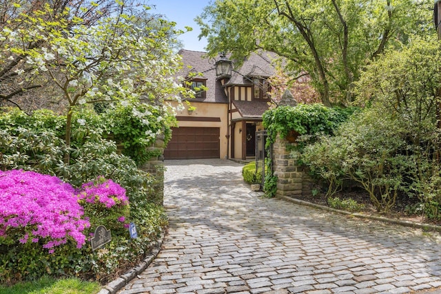 50 Hampshire Rd, Bronxville, NY 10708 - english style home with stucco siding and decorative driveway