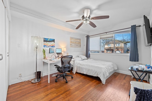299 Whitman Dr, Brooklyn, NY 11234 - bedroom with baseboards, ceiling fan, and wood finished floors
