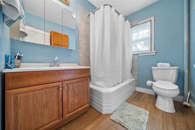 57 Higgins Trl, Monroe, NY 10950 - full bath featuring vanity, toilet, shower / bath combination with curtain, baseboards, and wood finished floors