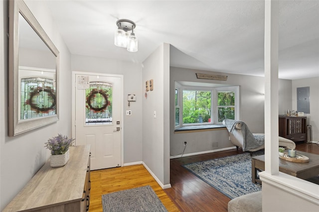 entrance foyer featuring light wood-style floors and baseboards