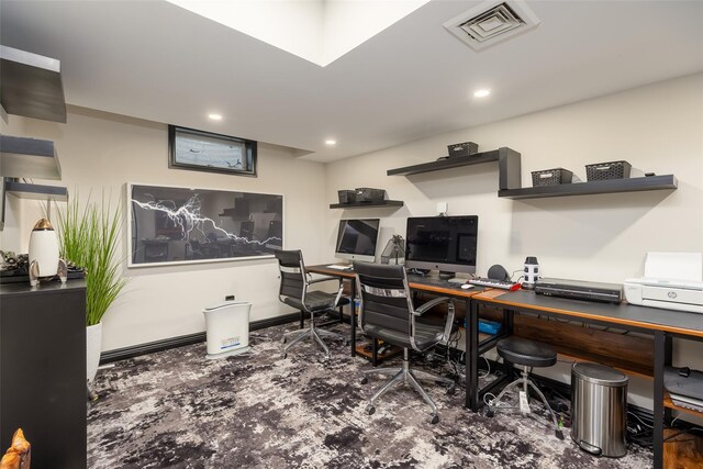 office space with visible vents and recessed lighting