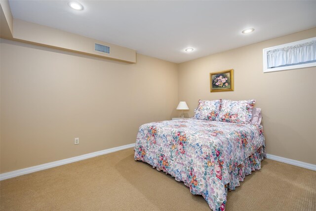 bedroom featuring visible vents, recessed lighting, carpet, and baseboards