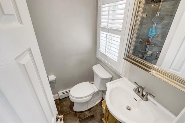 161 Bch 129th St, Rockaway Park, NY 11694 - bathroom featuring a baseboard radiator, a sink, toilet, tile patterned floors, and a tile shower