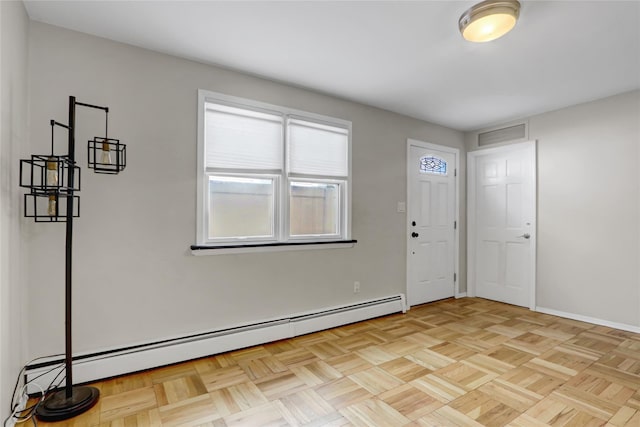 161 Bch 129th St, Rockaway Park, NY 11694 - entrance foyer featuring a baseboard radiator and baseboards