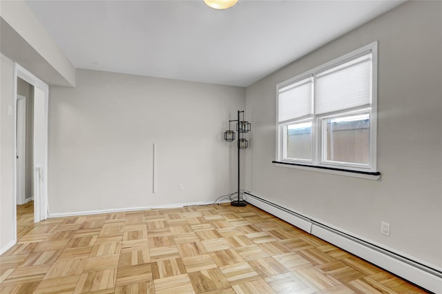 161 Bch 129th St, Rockaway Park, NY 11694 - unfurnished room with a baseboard heating unit and baseboards