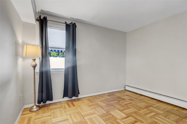 161 Bch 129th St, Rockaway Park, NY 11694 - empty room with a baseboard heating unit and baseboards