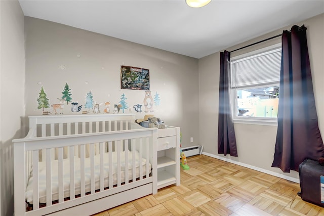 161 Bch 129th St, Rockaway Park, NY 11694 - bedroom featuring a baseboard radiator, a nursery area, and baseboards