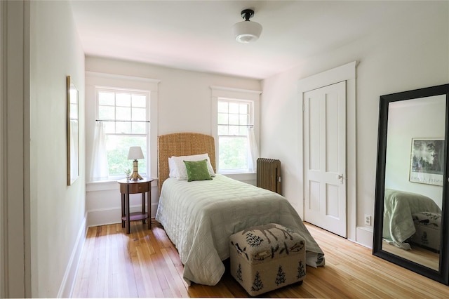 12 Highview Ave, Callicoon, NY 12723 - bedroom with radiator and light wood-type flooring