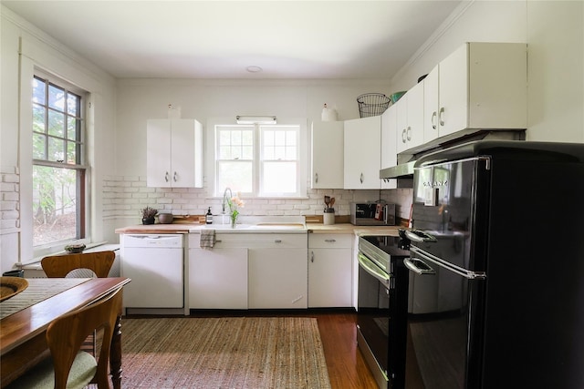12 Highview Ave, Callicoon, NY 12723 - kitchen with freestanding refrigerator, white dishwasher, light countertops, stainless steel range with electric stovetop, and dark wood-style flooring