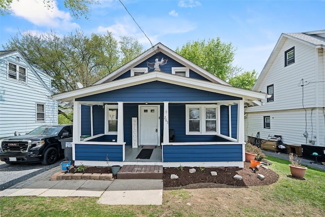 shotgun-style home with covered porch
