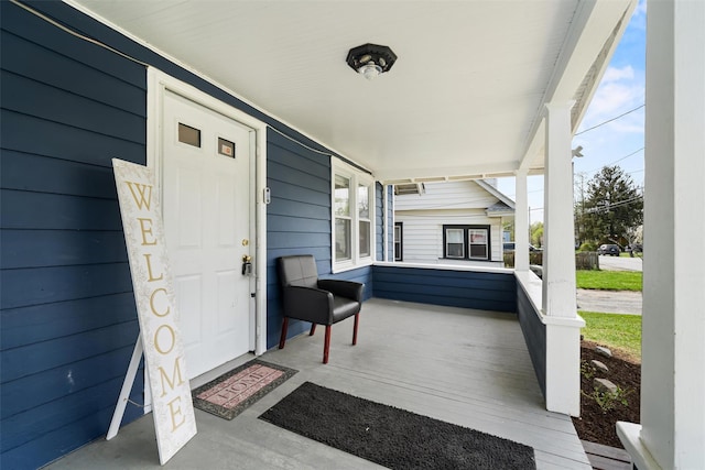 wooden deck featuring a porch