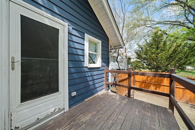 wooden deck featuring fence