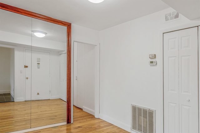 523 Colony Dr, Hartsdale, NY 10530 - unfurnished bedroom with light wood-style flooring, baseboards, and visible vents