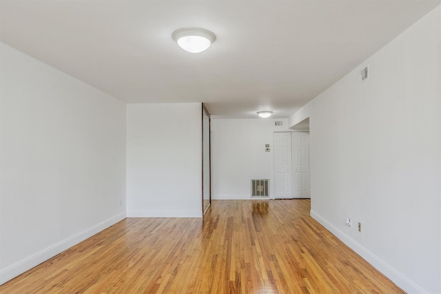 523 Colony Dr, Hartsdale, NY 10530 - empty room featuring light wood finished floors, visible vents, and baseboards
