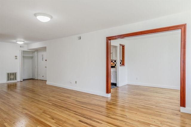 523 Colony Dr, Hartsdale, NY 10530 - unfurnished room with light wood finished floors, visible vents, and baseboards