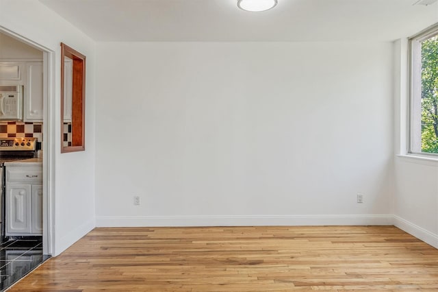523 Colony Dr, Hartsdale, NY 10530 - empty room featuring baseboards and wood finished floors