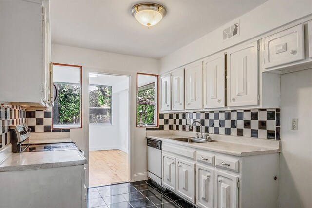 523 Colony Dr, Hartsdale, NY 10530 - kitchen featuring a sink, visible vents, dishwasher, light countertops, and electric stove