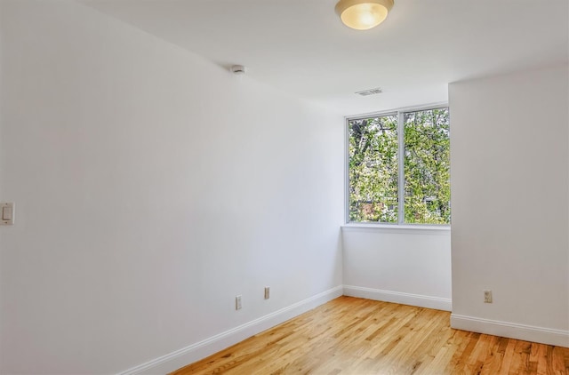 523 Colony Dr, Hartsdale, NY 10530 - unfurnished room featuring baseboards, light wood-type flooring, and visible vents